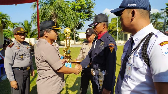 Pimpin Upacara HUT Satpam ke-39, Kapolres Kotamobagu Ajak Do’akan Kapolri ke-8