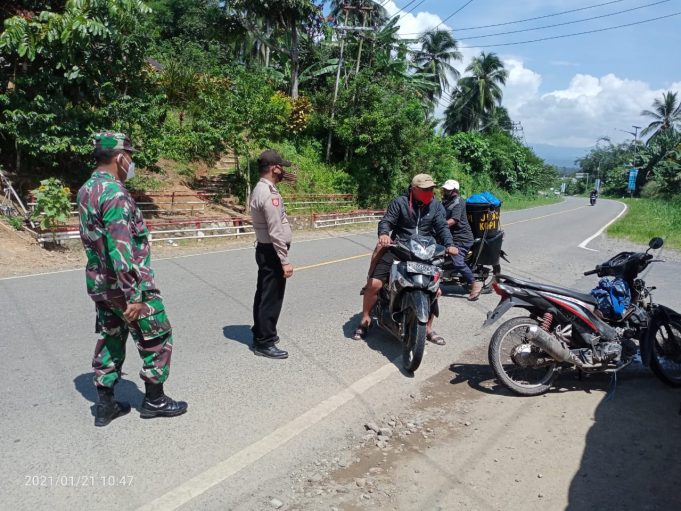Kotamobagu mengalami penurunan jumlah Covid-19 yang signifikan, Polsek Lolayan rutin gelar Ops Yustisi di pintu masuk.