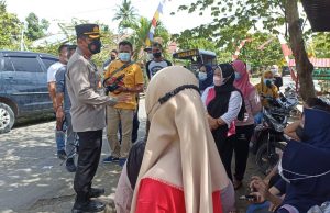 Kapolres Kotamobagu berikan himbauan Kamtibmas & Prokes saat kunjungi setiap TPS di Kecamatan Lolayan hingga Passi Bersatu.