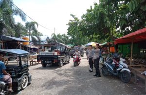 Personil Polsubsektor Kotamobagu Selatan Melaksanakan Patroli Di Pasar Poyowa Kecil