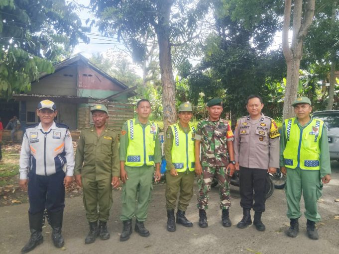 Bersama TNI dan Linmas, Polsek Kotamobagu Utara Amankan Lebaran Ketupat Desa Pontodon