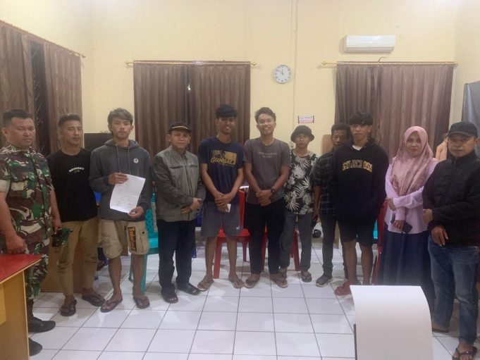 Sat Reskrim Polres Kotambagu Selesaikan Keributan Antar Warga Dengan Restorative Justice