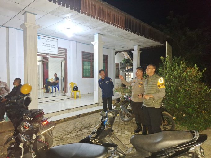 Wakapolres Kotamobagu Kompol Arie Prakoso Memastikan Keamanan Rapat Pleno di PPK Kecamatan Lolayan
