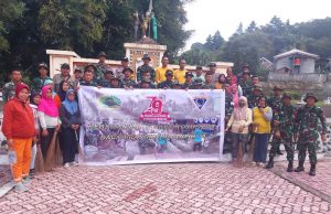 Sinergi Polsek Kotamobagu Bersama Yonif 713/ST Dalam Karya Bakti HUT TNI ke-79 di TMP Mongkonai