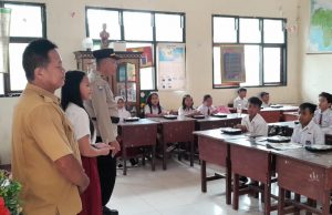 Satuan Binmas Laksanakan Gerakan MOTABI Polres Kotamobagu, Bagikan Makanan Bergizi di SD Negeri 2 Tabang