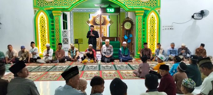 Da’i Polri Polres Kotamobagu Isi Tausiyah Isra Mi’raj Nabi Muhammad SAW di Desa Moyag