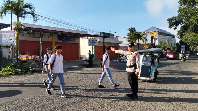 Polres Kotamobagu Gelar Strong Point Pagi: Jamin Kelancaran Lalu Lintas dan Kenyamanan Aktivitas Masyarakat