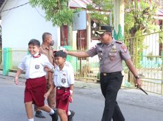 PAGI DIMULAI DENGAN PENGABDIAN, KAPOLRES KOTAMOBAGU PIMPIN STRONG POINT DEMI KESELAMATAN PENGGUNA JALAN